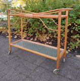 Rottinkinen kukkapöytä pyörillä